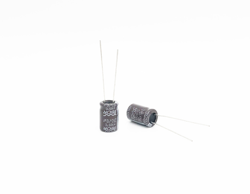 อุณหภูมิกว้าง 22X35MM 10uf 250v Capacitor สำหรับหลอดไฟประหยัดพลังงาน